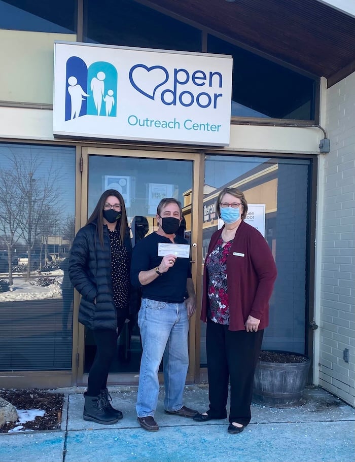 Open-Door-Outreach-check-scaled